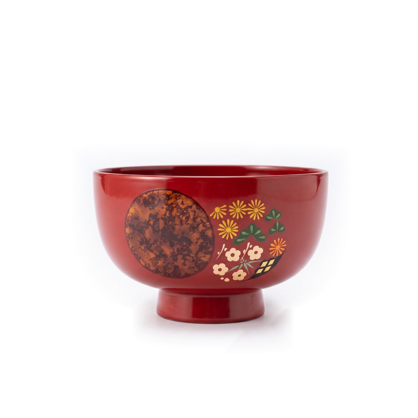 A single red soup bowl on a raised foot, its mottled copper circle beside chrysanthemum, pine, and plum blossom motifs.