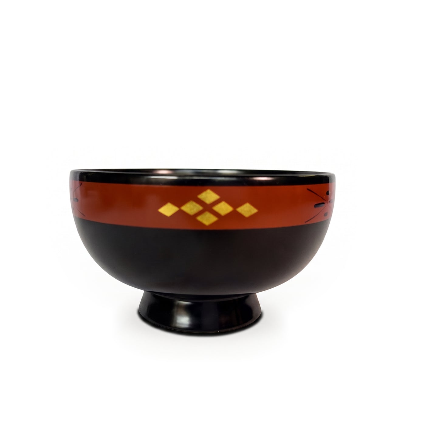 A black lacquer bowl on a high foot, with a rust-toned rim band showing gold diamonds and a thin cross-and-dot motif.