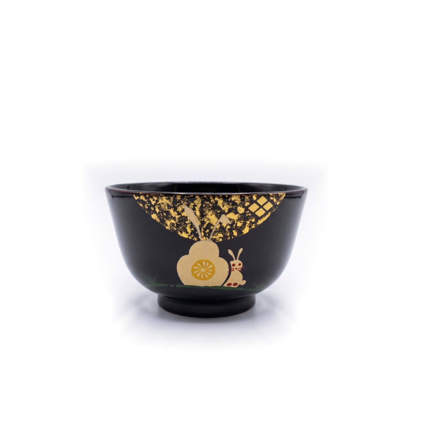 The black bowl seen from the front, a fan of gold leaf above the rabbit and blossom, with a small check of gold diamonds.