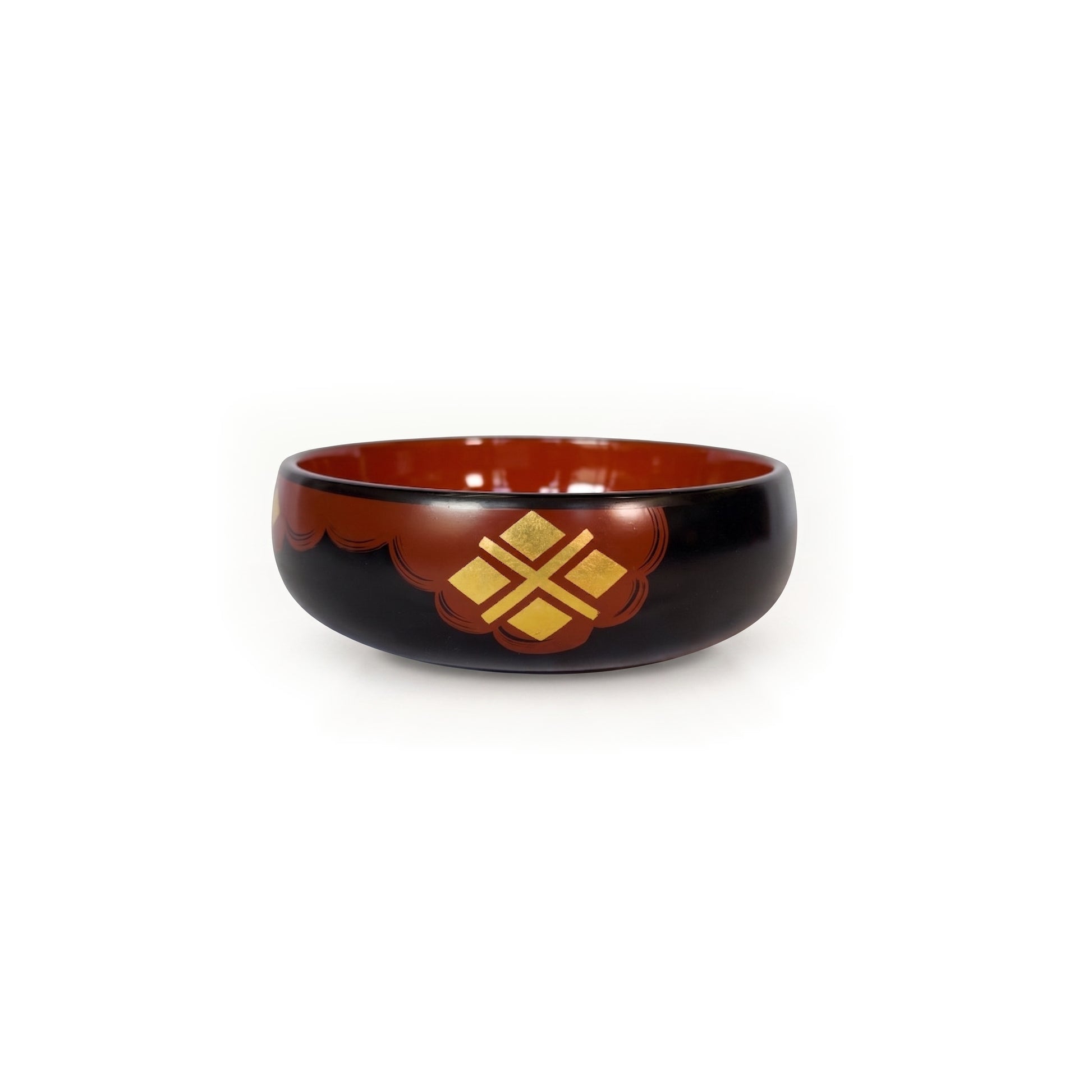 A black lacquer bowl with a deep red interior, a red cloud band across its front holding four gold diamonds in a cross.