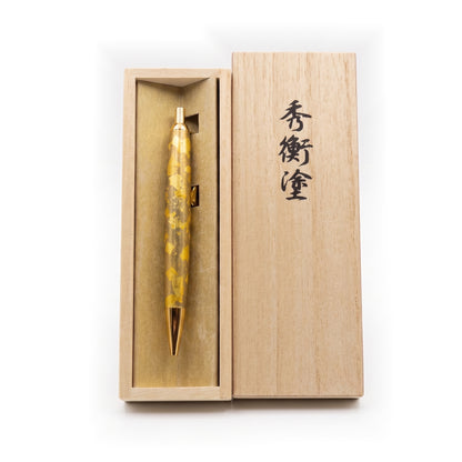 The pen standing in its wooden box, the lid propped beside it and brushed with the characters for Hidehira-nuri.
